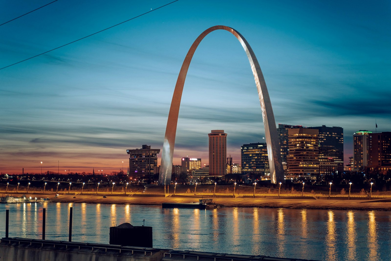 The Gateway Arch over downtown St. Louis at golden hour
